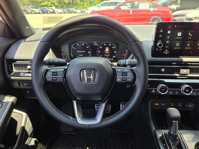 Photo of 2025 Solar Silver Metallic Honda Civic Hybrid