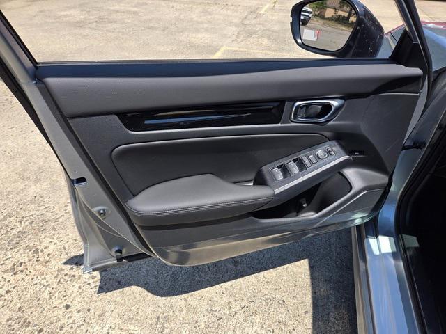 Photo of 2025 Solar Silver Metallic Honda Civic Hybrid