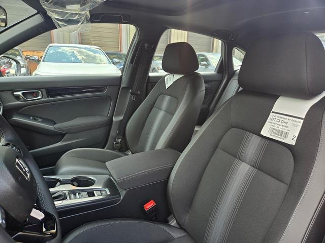 Photo of 2025 Boost Blue Pearl Honda Civic Hybrid