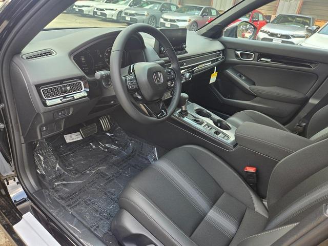 Photo of 2025 Boost Blue Pearl Honda Civic Hybrid