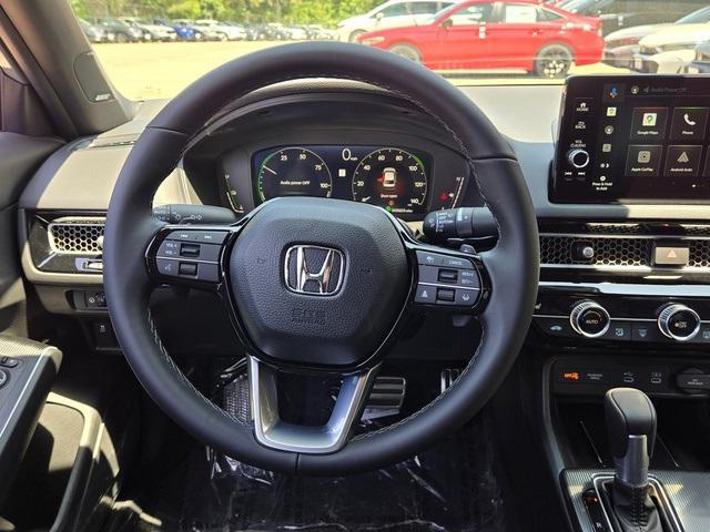 Photo of 2025 Urban Gray Pearl Honda Civic Hybrid