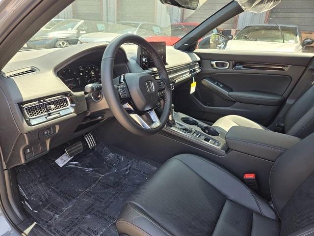 Photo of 2025 Urban Gray Pearl Honda Civic Hybrid