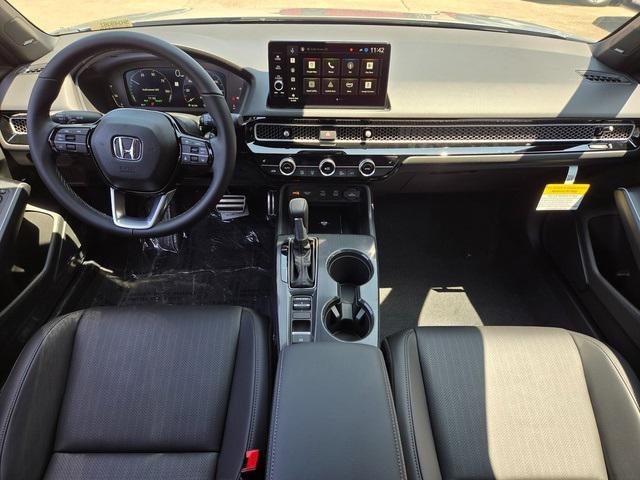 Photo of 2025 Urban Gray Pearl Honda Civic Hybrid