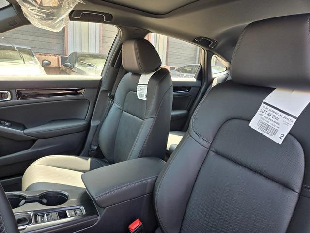 Photo of 2025 Urban Gray Pearl Honda Civic Hybrid