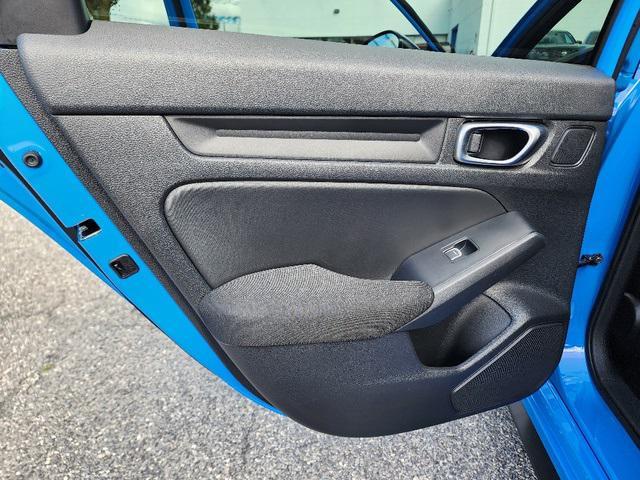 Photo of 2024 Boost Blue Pearl Honda Civic