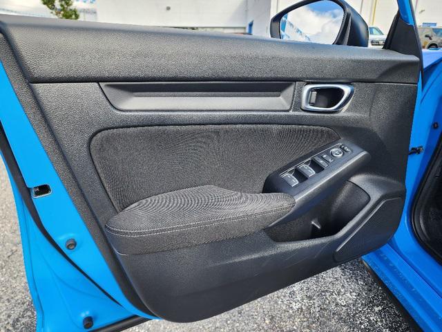 Photo of 2024 Boost Blue Pearl Honda Civic