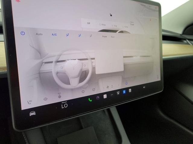 Photo of 2023 White Tesla Model 3