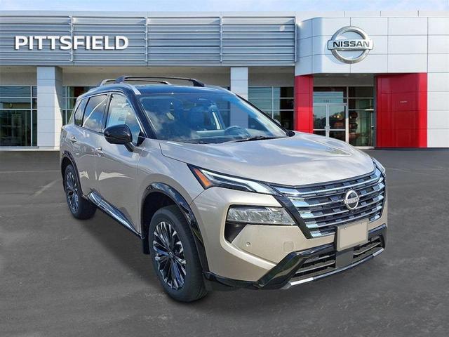 Photo of 2026 Champagne Silver Metallic/Super Black Nissan Rogue