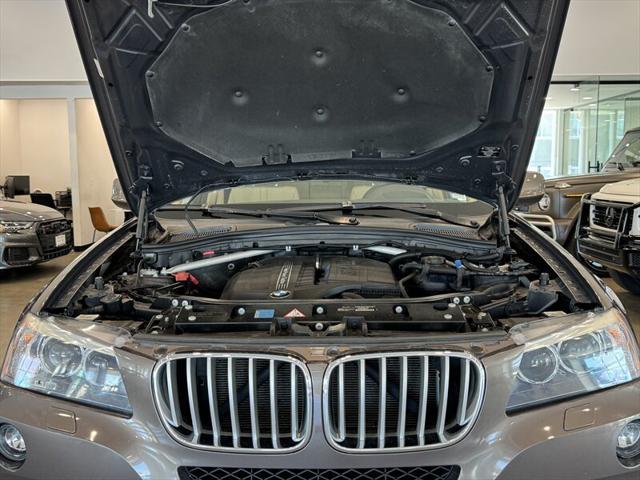 Photo of 2011 Sparkling Bronze Metallic BMW X3
