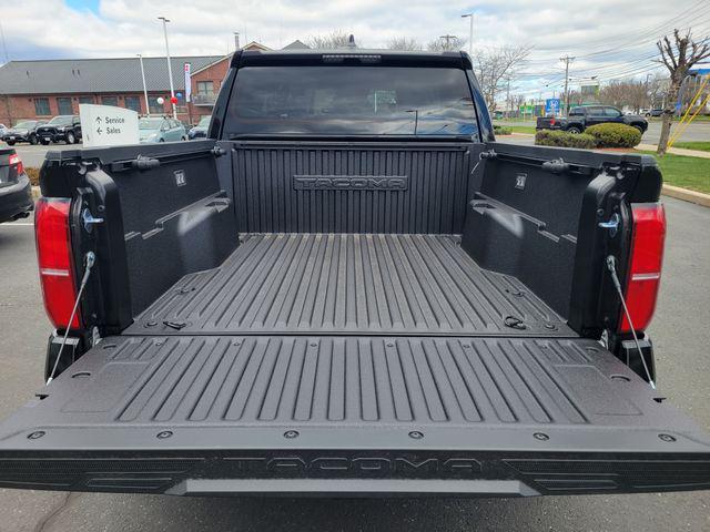 Photo of 2025 Black Toyota Tacoma