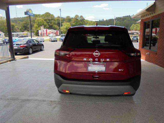 Photo of 2023 Scarlet Ember Tintcoat Nissan Rogue