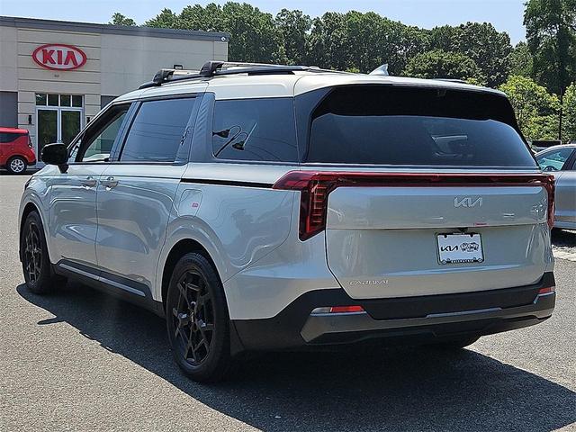 Photo of 2025 Ivory Silver Kia Carnival