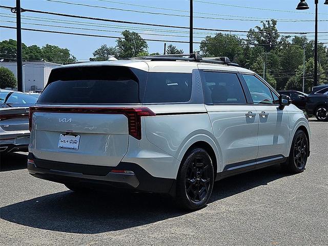 Photo of 2025 Ivory Silver Kia Carnival