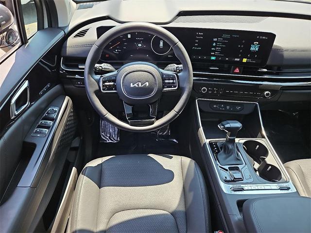 Photo of 2025 Ivory Silver Kia Carnival