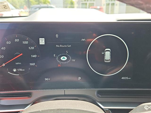 Photo of 2025 Ivory Silver Kia Carnival