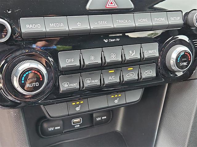 Photo of 2021 Black Cherry Kia Sportage