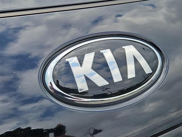 Photo of 2021 Black Cherry Kia Sportage