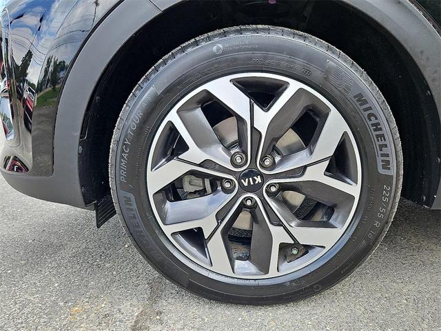 Photo of 2021 Black Cherry Kia Sportage