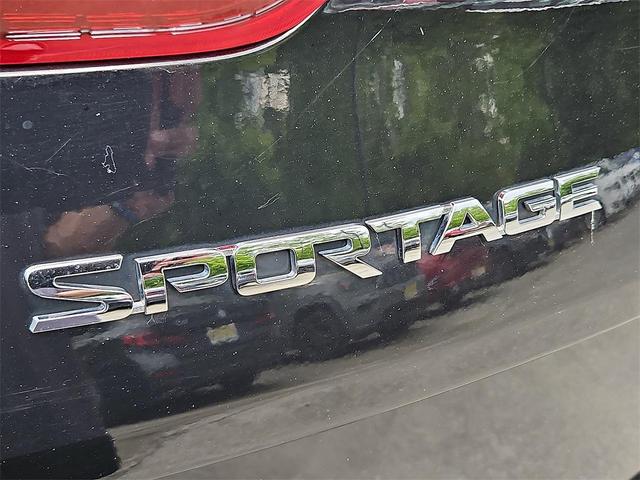 Photo of 2021 Black Cherry Kia Sportage