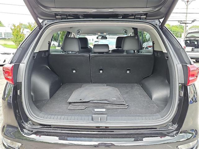 Photo of 2021 Black Cherry Kia Sportage
