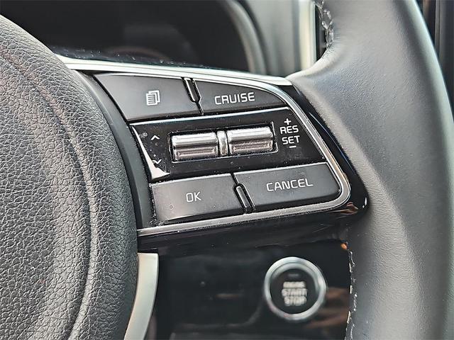 Photo of 2021 Black Cherry Kia Sportage