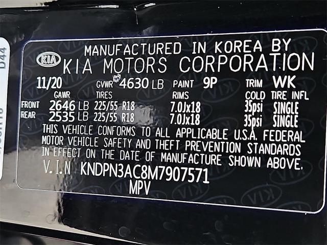 Photo of 2021 Black Cherry Kia Sportage