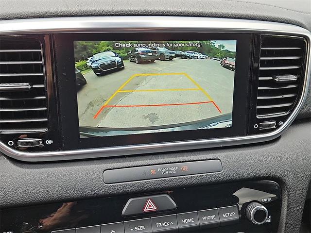 Photo of 2021 Black Cherry Kia Sportage