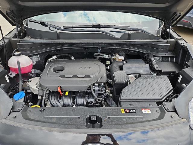 Photo of 2021 Black Cherry Kia Sportage