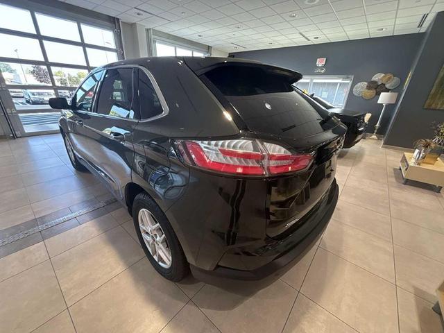 Photo of 2024 Forged Green Metallic Ford Edge