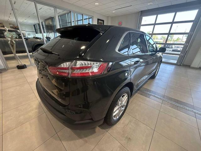 Photo of 2024 Forged Green Metallic Ford Edge