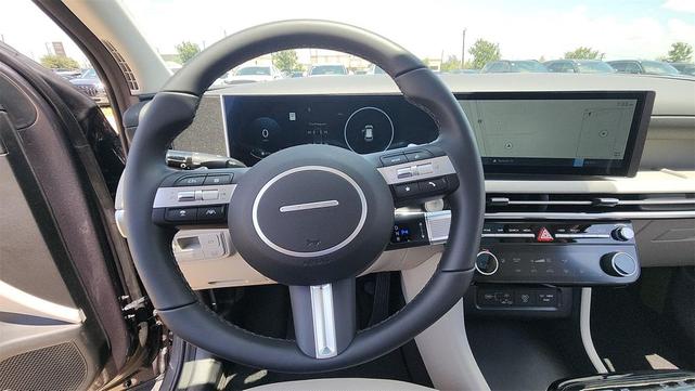 Photo of 2025 Titan Gray Hyundai TUCSON Hybrid