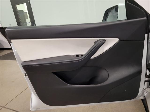 Photo of 2021 Pearl White Multi-Coat Tesla Model Y