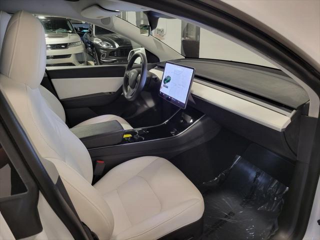 Photo of 2021 Pearl White Multi-Coat Tesla Model Y