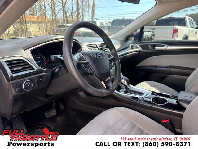 Photo of 2013 Deep Impact Blue Ford Fusion