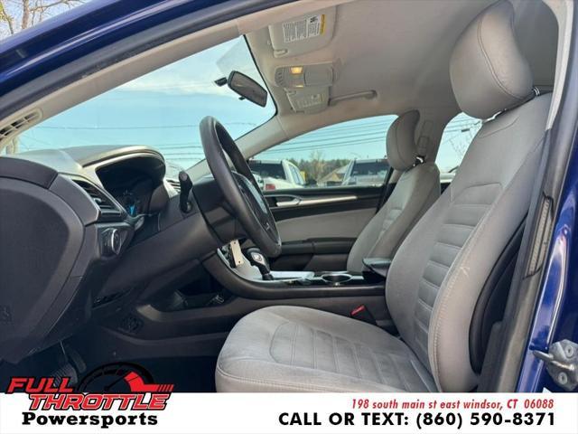 Photo of 2013 Deep Impact Blue Ford Fusion