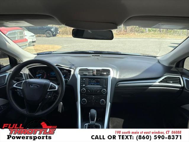 Photo of 2013 Deep Impact Blue Ford Fusion