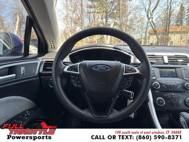 Photo of 2013 Deep Impact Blue Ford Fusion
