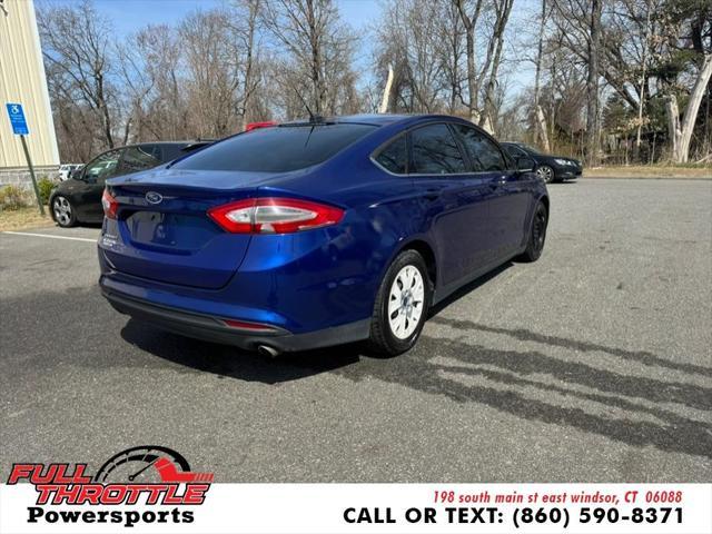 Photo of 2013 Deep Impact Blue Ford Fusion