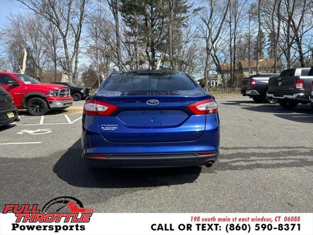 Photo of 2013 Deep Impact Blue Ford Fusion