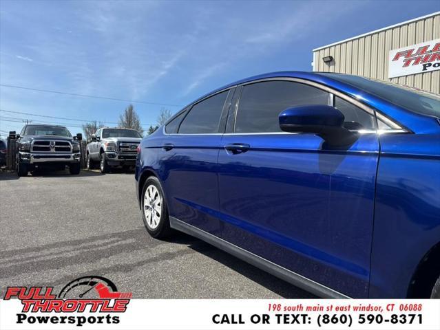 Photo of 2013 Deep Impact Blue Ford Fusion