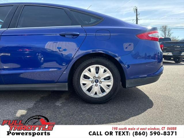 Photo of 2013 Deep Impact Blue Ford Fusion