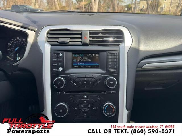 Photo of 2013 Deep Impact Blue Ford Fusion