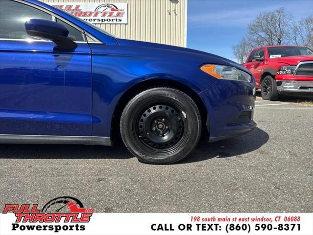 Photo of 2013 Deep Impact Blue Ford Fusion