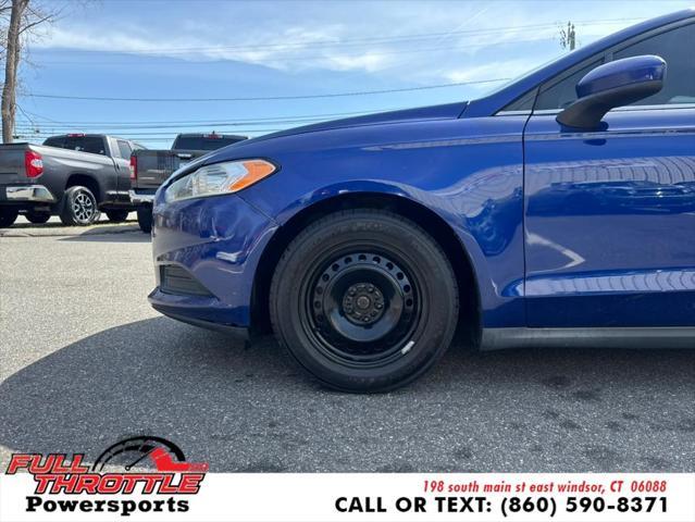 Photo of 2013 Deep Impact Blue Ford Fusion
