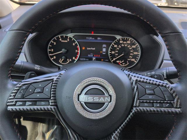 Photo of 2024 Pearl White Tricoat Nissan Altima