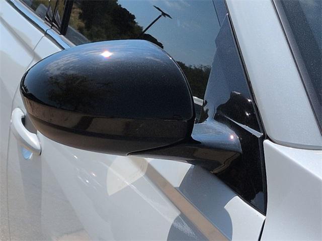 Photo of 2024 Pearl White Tricoat Nissan Altima