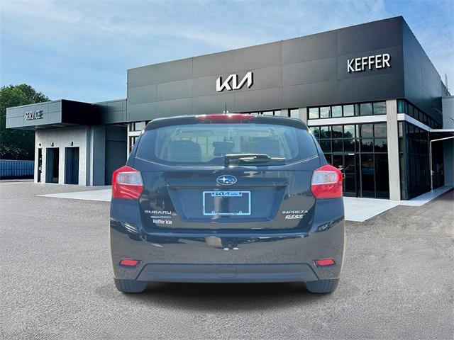 Photo of 2013 Crystal Black Silica Subaru Impreza