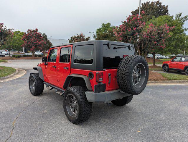 Photo of 2015 Firecracker Red Clear Coat Jeep Wrangler Unlimited