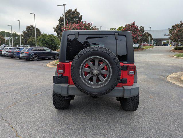 Photo of 2015 Firecracker Red Clear Coat Jeep Wrangler Unlimited