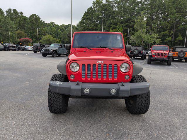 Photo of 2015 Firecracker Red Clear Coat Jeep Wrangler Unlimited